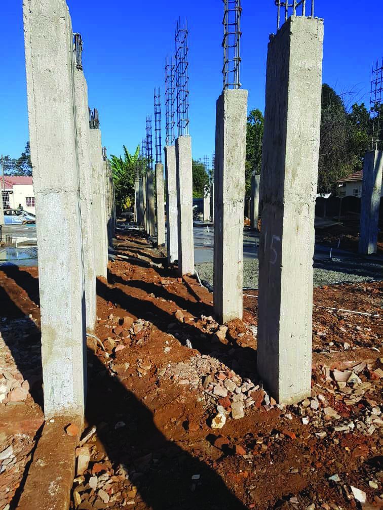 Avondale office block structural columns under construction